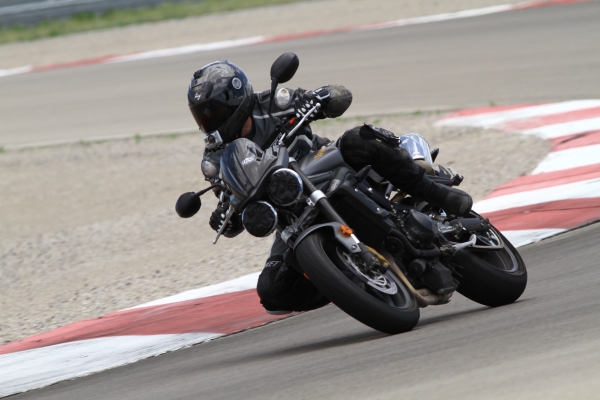 Utah consumer protection attorneys Eric Stephenson racing a motorcycle at Miller Motor Sports Park